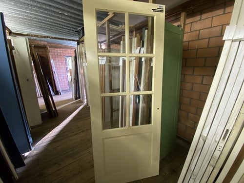 Gebruikte binnendeur 930x2310 stomp hout gebroken wit