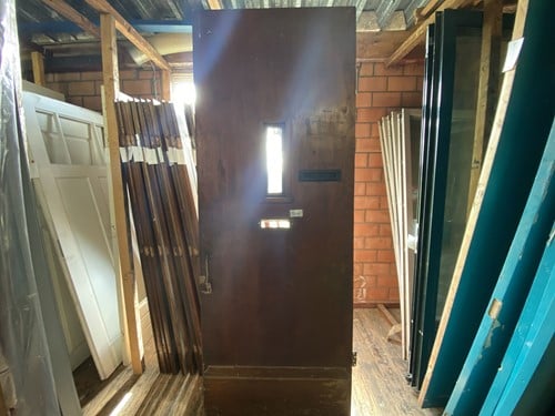 Gebruikte buitendeur 925x2445 linksdraaiend stomp hout bruin