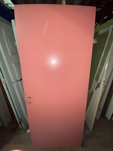 Gebruikte binnendeur 880x2110 linksdraaiend stomp hout roze met slot