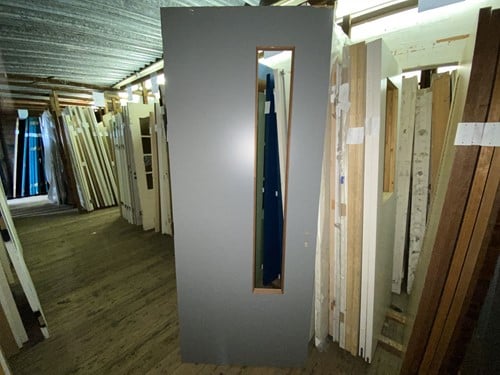 Gebruikte binnendeur 920x2310 linksdraaiend stomp hout grijs