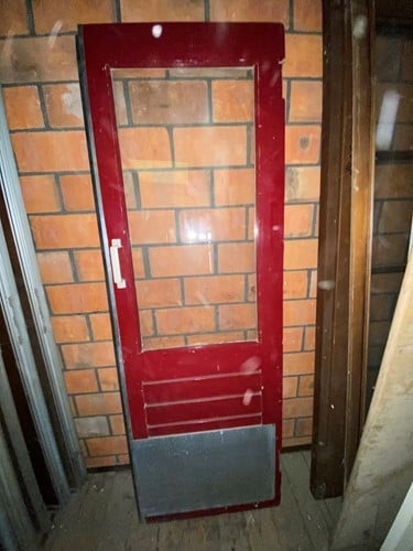 Gebruikte binnendeur 705x2115 linksdraaiend stomp hout rood