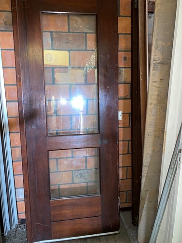 Gebruikte binnendeur 861x2276 linksdraaiend stomp hout donkerbruin met glas