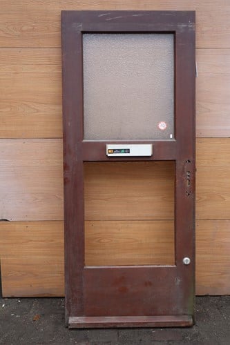 Gebruikte buitendeur 885x2100 rechtsdraaiend stomp hout bruin