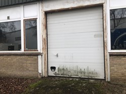 Gebruikte overheaddeur B2500 x H2850mm hand bediend