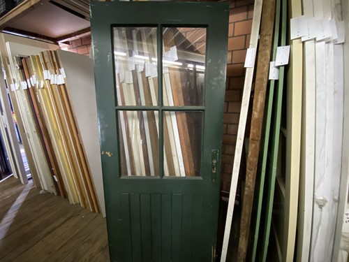 Gebruikte binnendeur 895x2100 rechtsdraaiend stomp hout groen/wit